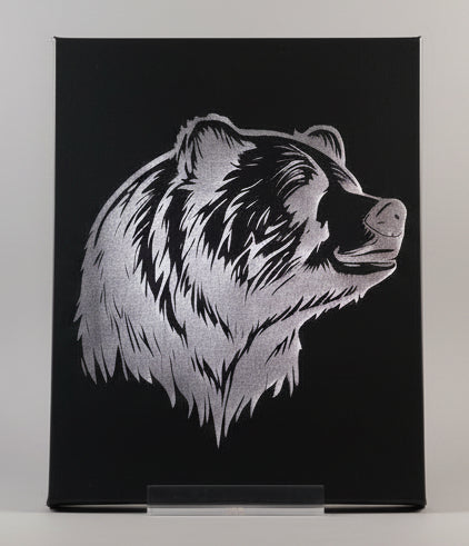 Canvas print of a bear's face on a black background