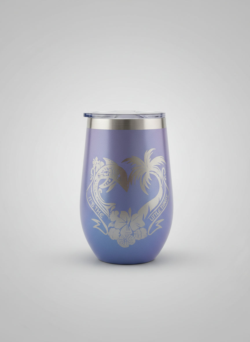 Blue tumbler with a design on a grey background.