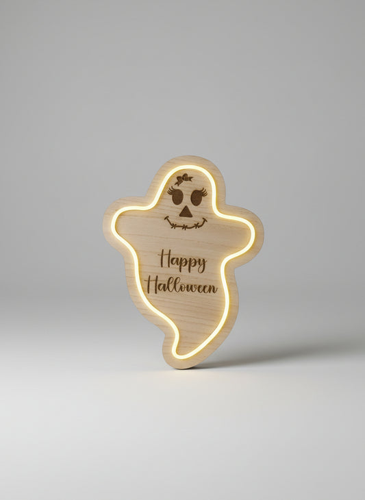 Wooden ghost-shaped sign with 'Happy Halloween' text, illuminated from within.