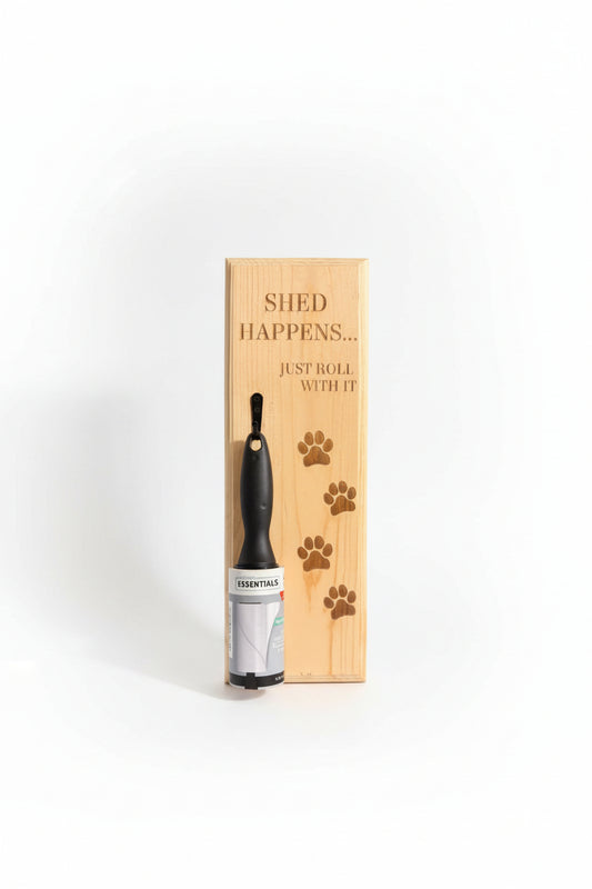 Pet grooming product with wooden box featuring 'Shed Happens... Just Roll With It' text.